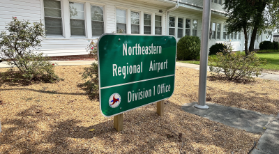Northeastern Regional Airport and NCDOT Division 1 sign outside office