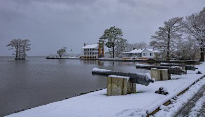 The Penelope Barker House and waterfront cannon strip in the snow