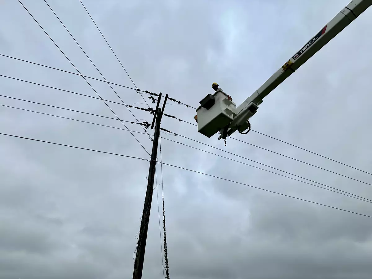 An Edenton Electric lineman working during a tropical storm
